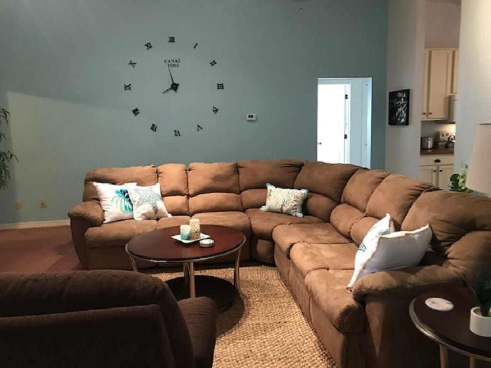 Roomy living room with comfortable seating for guests 