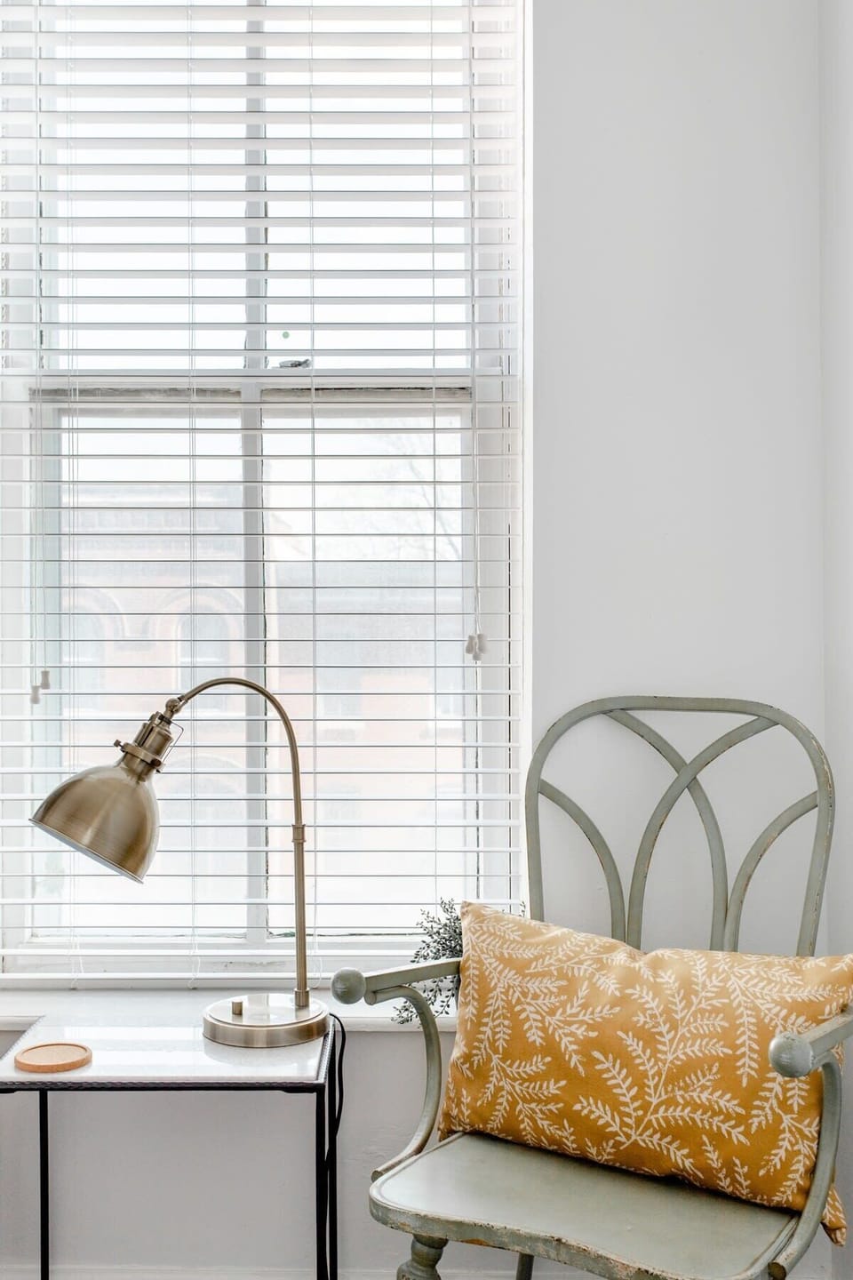 Charming corner with a reading chair and natural light, a perfect little spot to unwind or sip your morning coffee. #ReadingNook