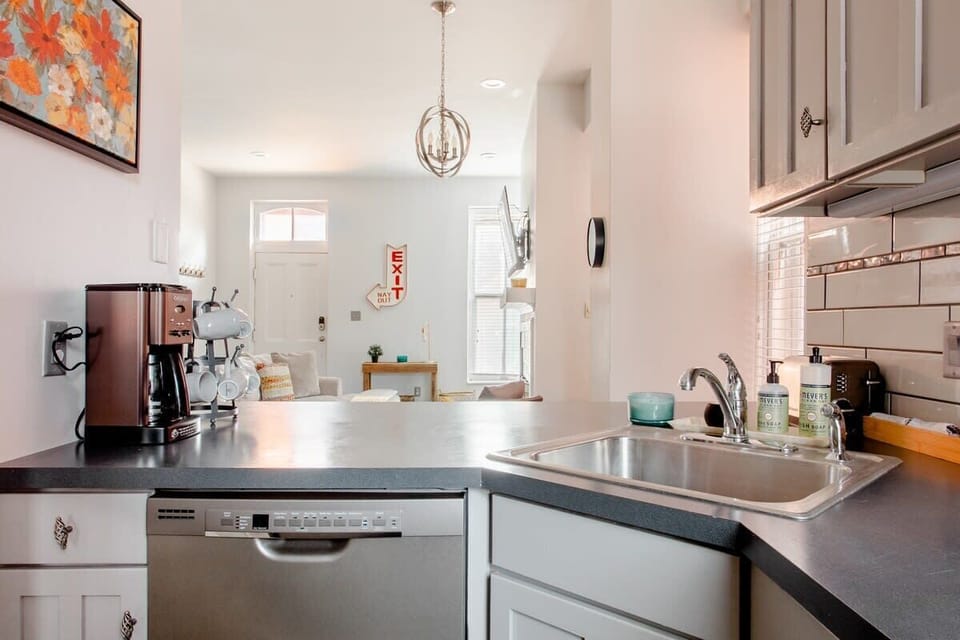 Start your mornings right with a dedicated coffee setup and bright kitchen space. #CoffeeStation