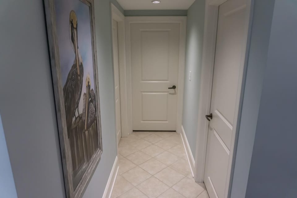 Bright, cozy hallway leading to your private retreat