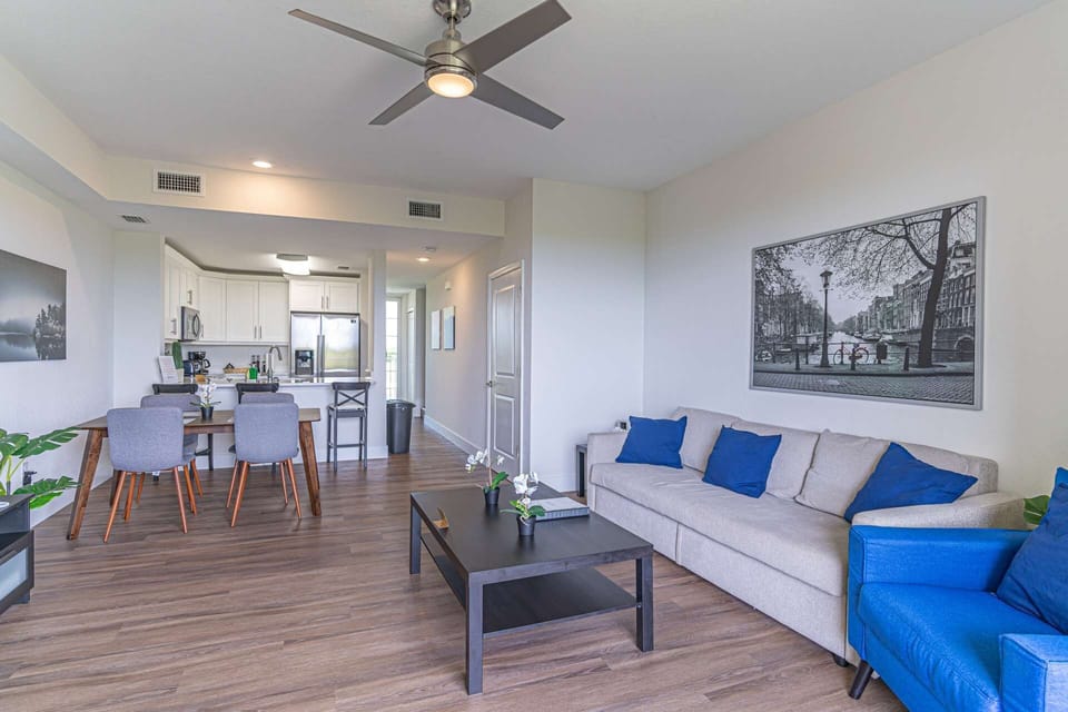 Comfortable Living Room Furniture, Ceiling Fan and Laminate Flooring