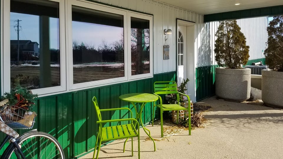 A covered porch greets you
