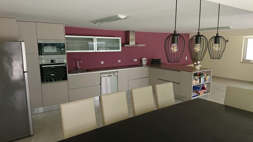 Kitchen on the ground floor leading out to pool patio 
