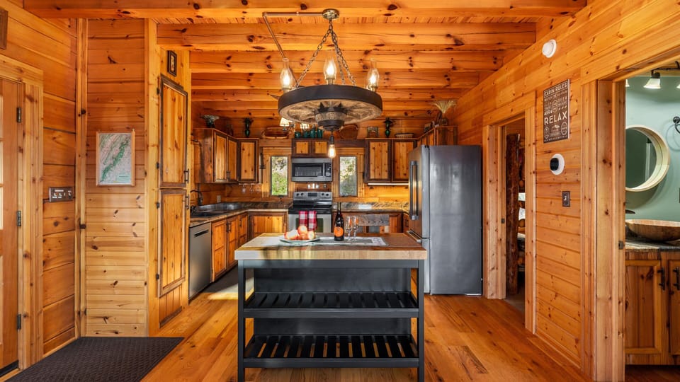 Main Level Entrance Area. Kitchen Island. Access to bunk room and full bathroom.