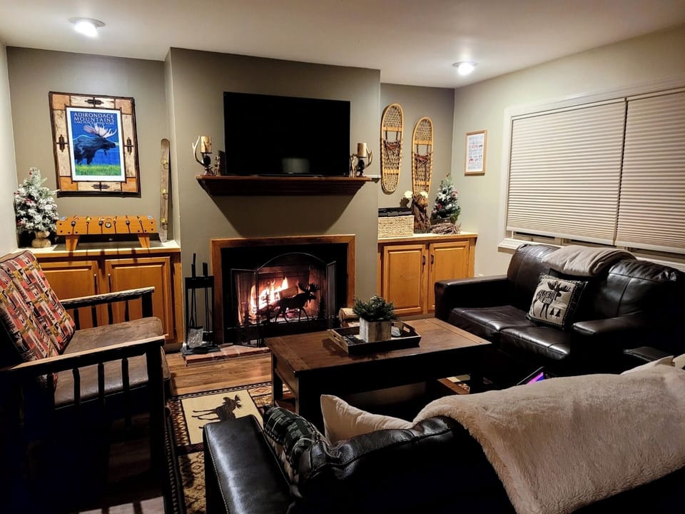Our cozy living room with wood burning fireplace