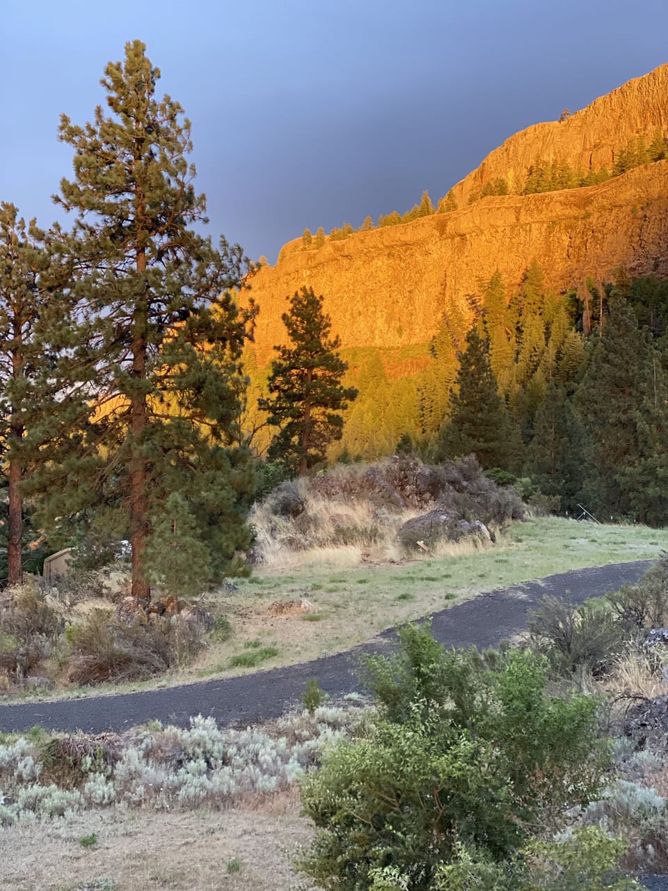 View of rock cliffs from side porch