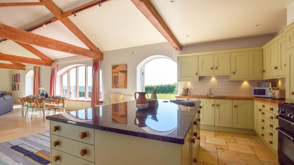 The kitchen is perfectly designed for sociable cooking and relaxed entertaining.