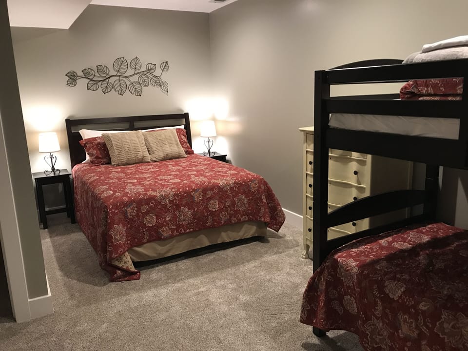 Bedroom #3, queen bed, bunk bed, lower level.