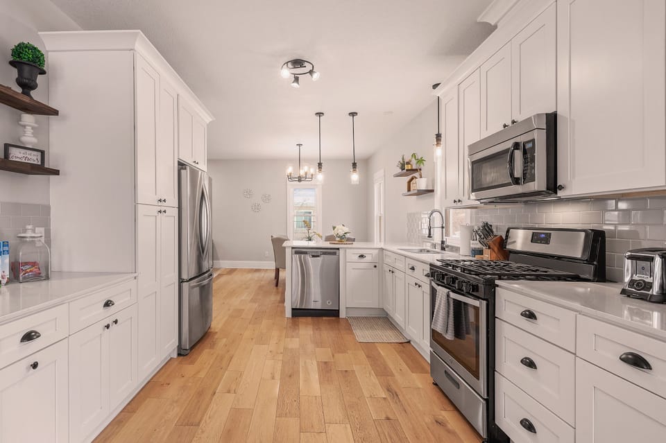 Newly Gourmet Kitchen with upgraded appliances & everything you need for meals