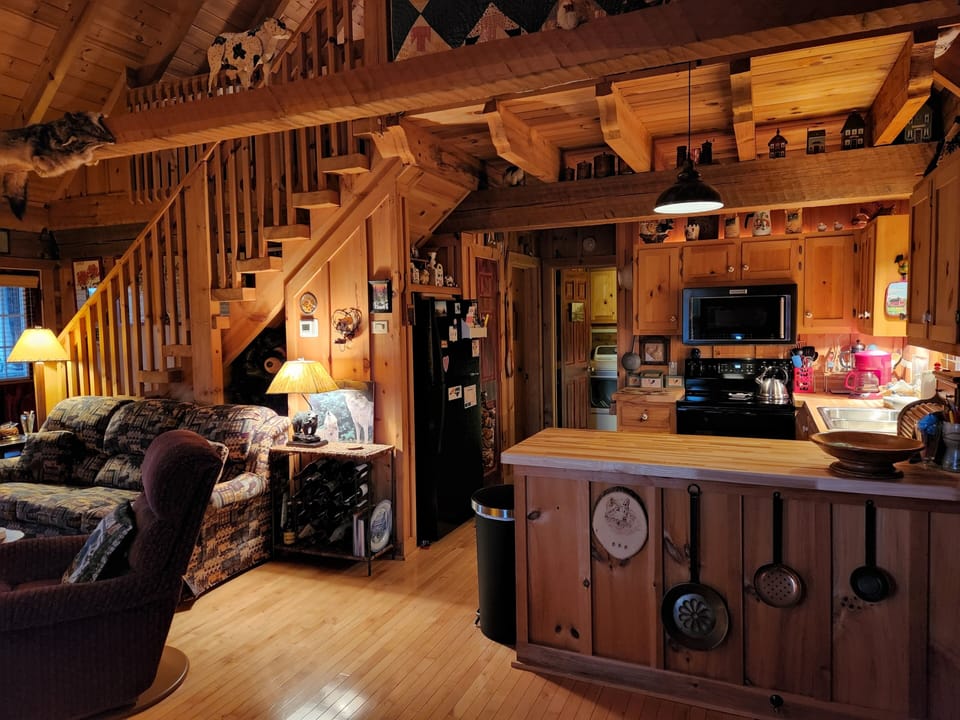 View to living area and kitchen from dining area