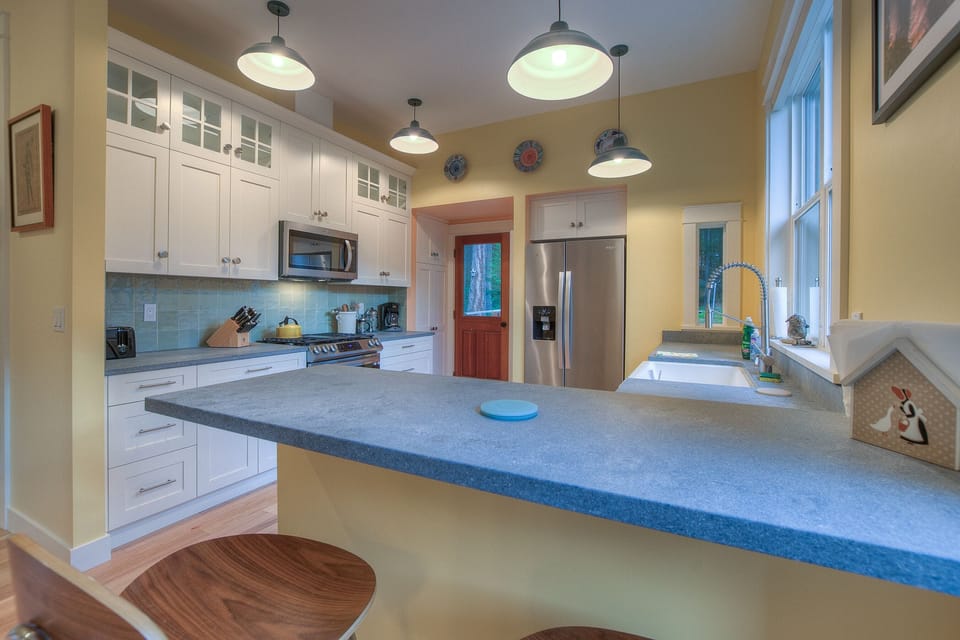 Additional seating at the island plus more counter space.