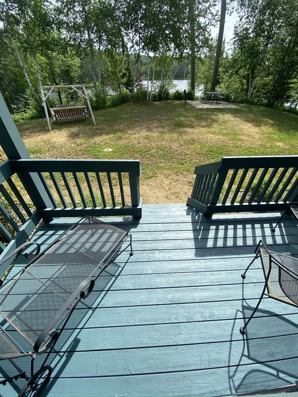 Summer patio on Wynne Point, picnic table, bbq station.