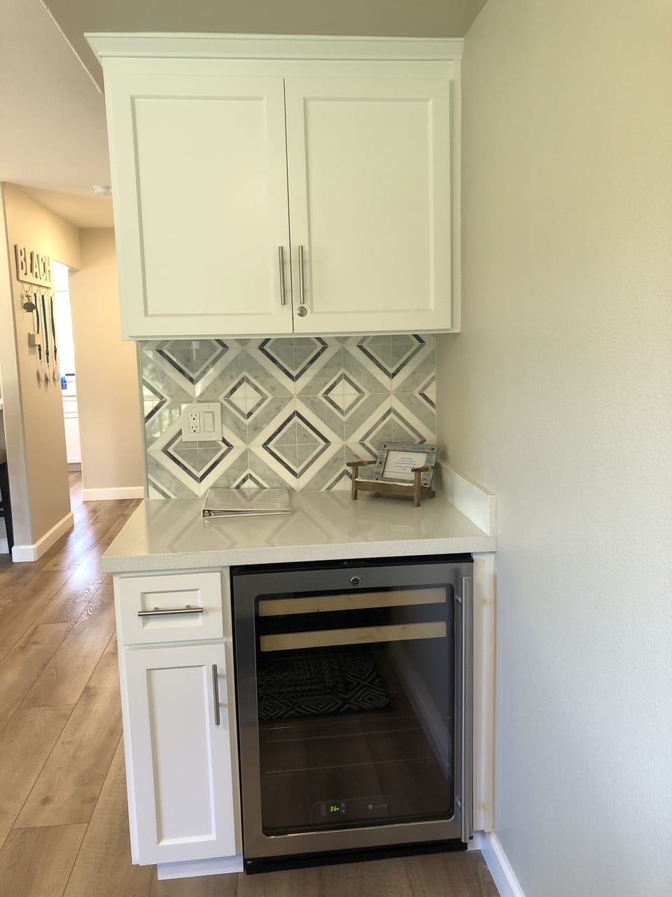 New dry bar with beverage fridge. 