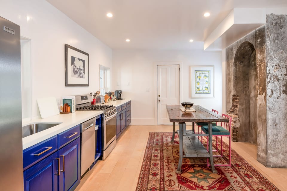 Fully-stocked kitchen with seating for two 