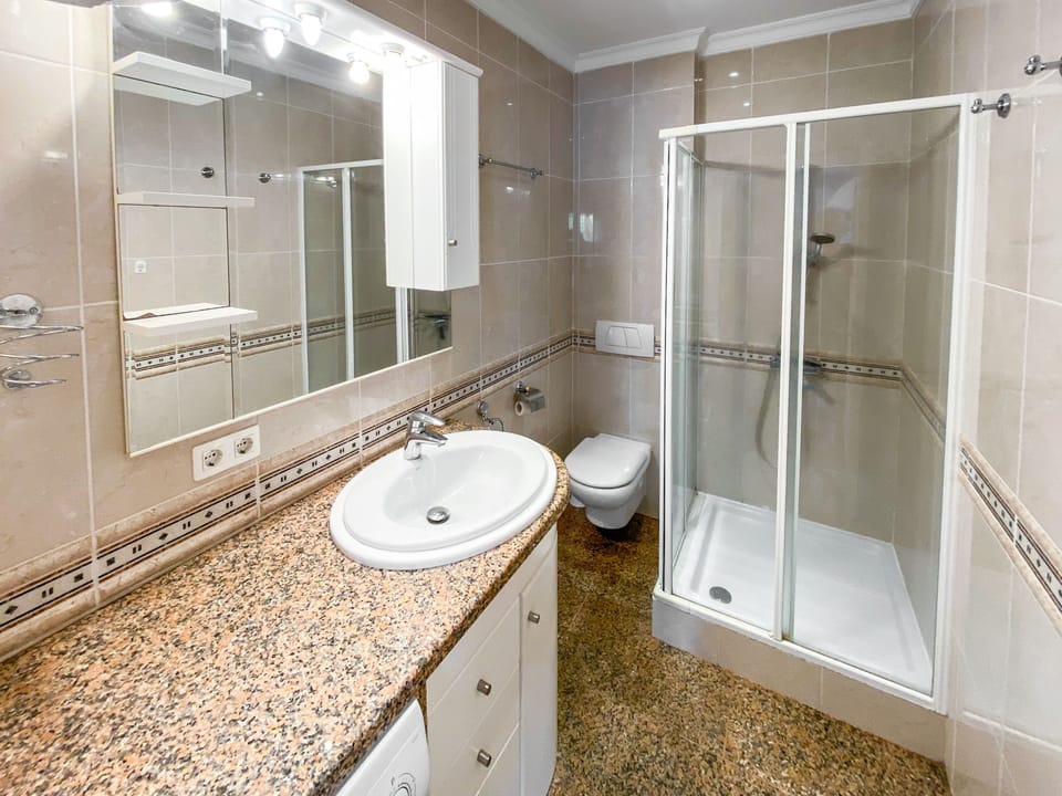 Bathroom with shower / toilet