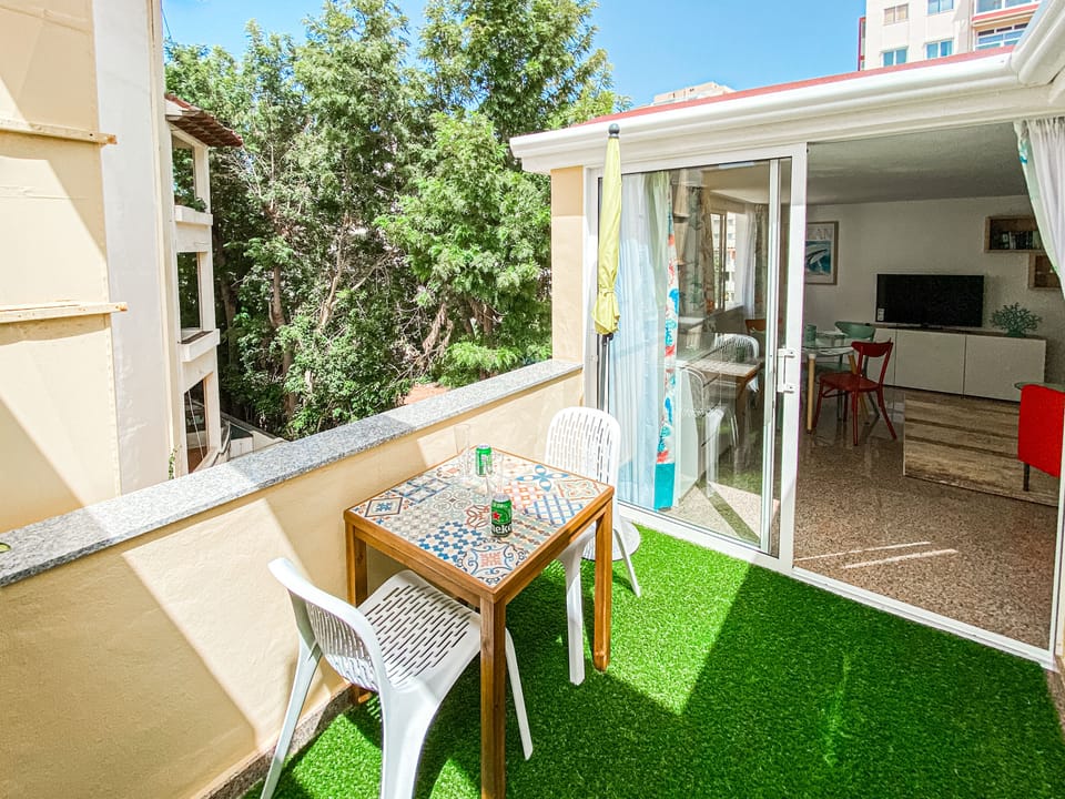 Terrace towards hotel gardens and living room