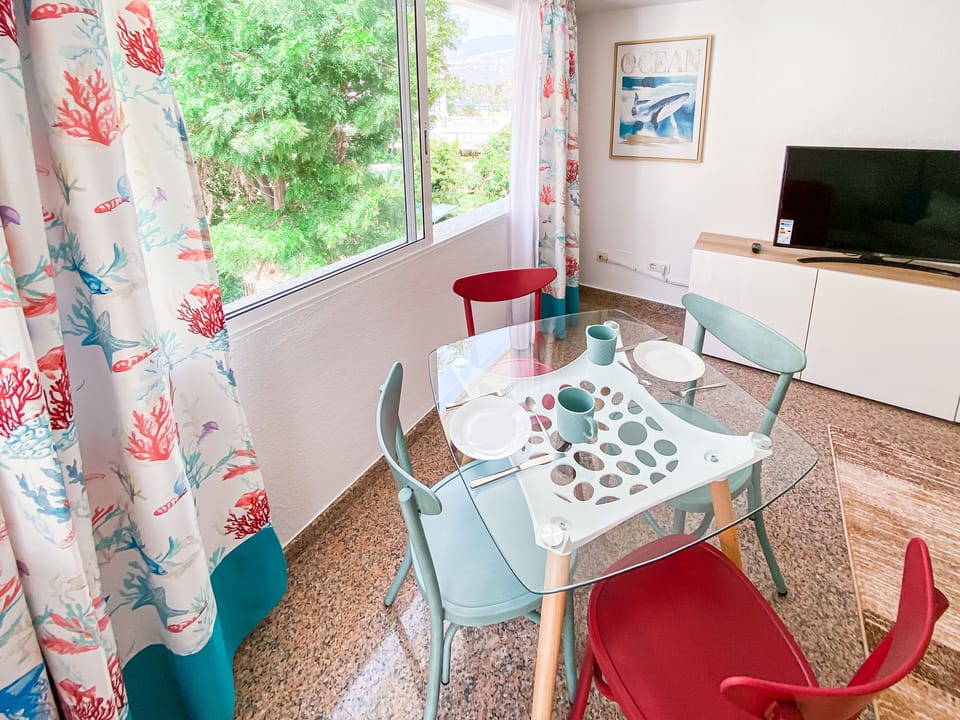 Seating for four in the dining area