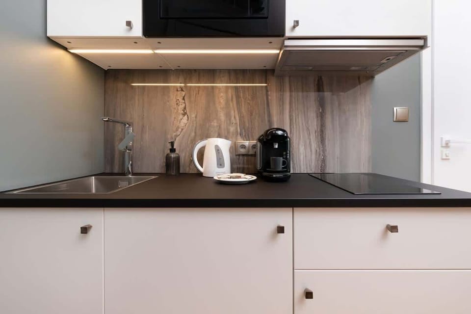 The kitchenette's practical layout maximizes space and functionality.