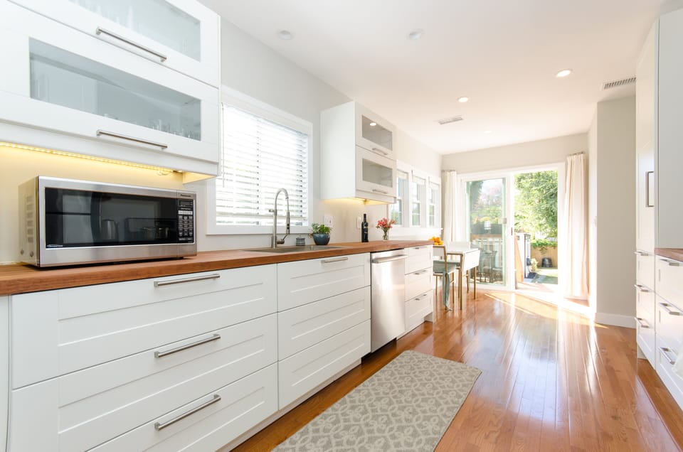 Large galley kitchen with plenty of pots/pans/utensils/glassware and china