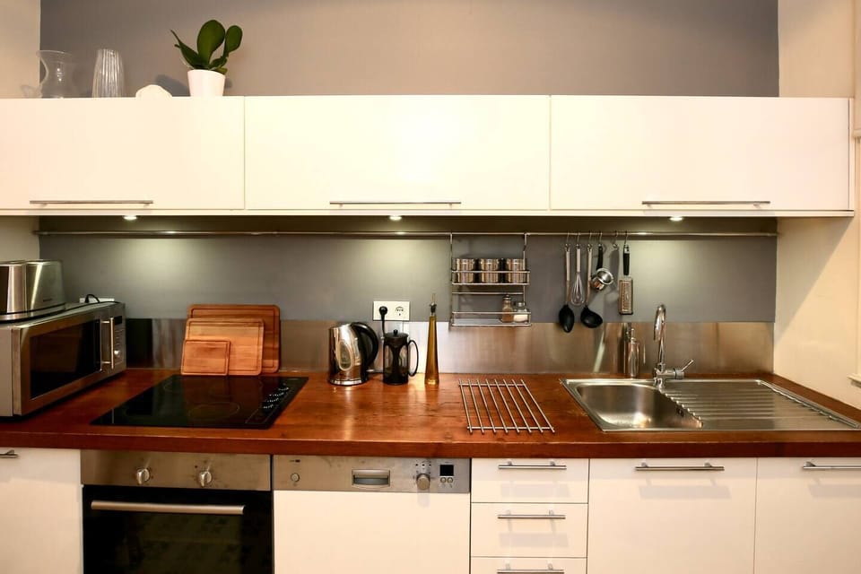 Bespoke handmade kitchen cabinets crafted to our own design by our local carpenter.