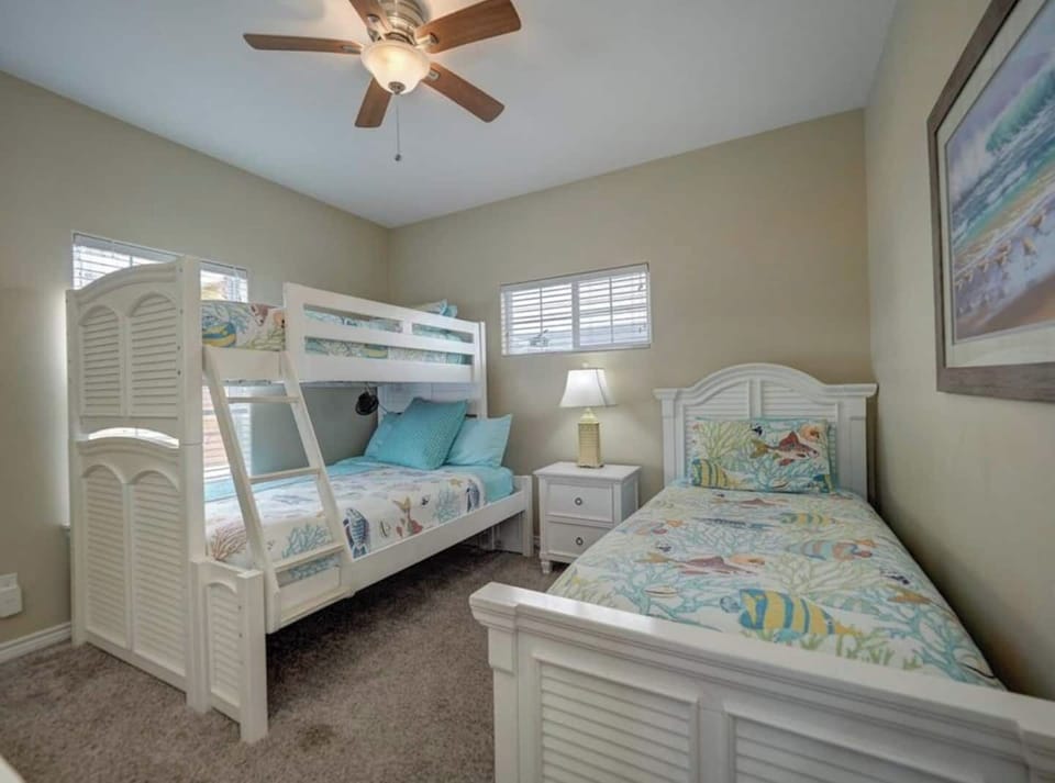 1st floor second bedroom with bunk bed (twin/full), and separate twin bed.