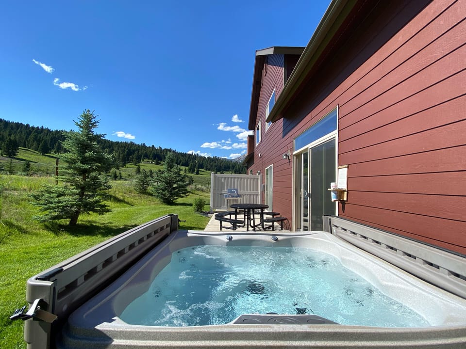 Mountain views abound while you soak your tired muscles.