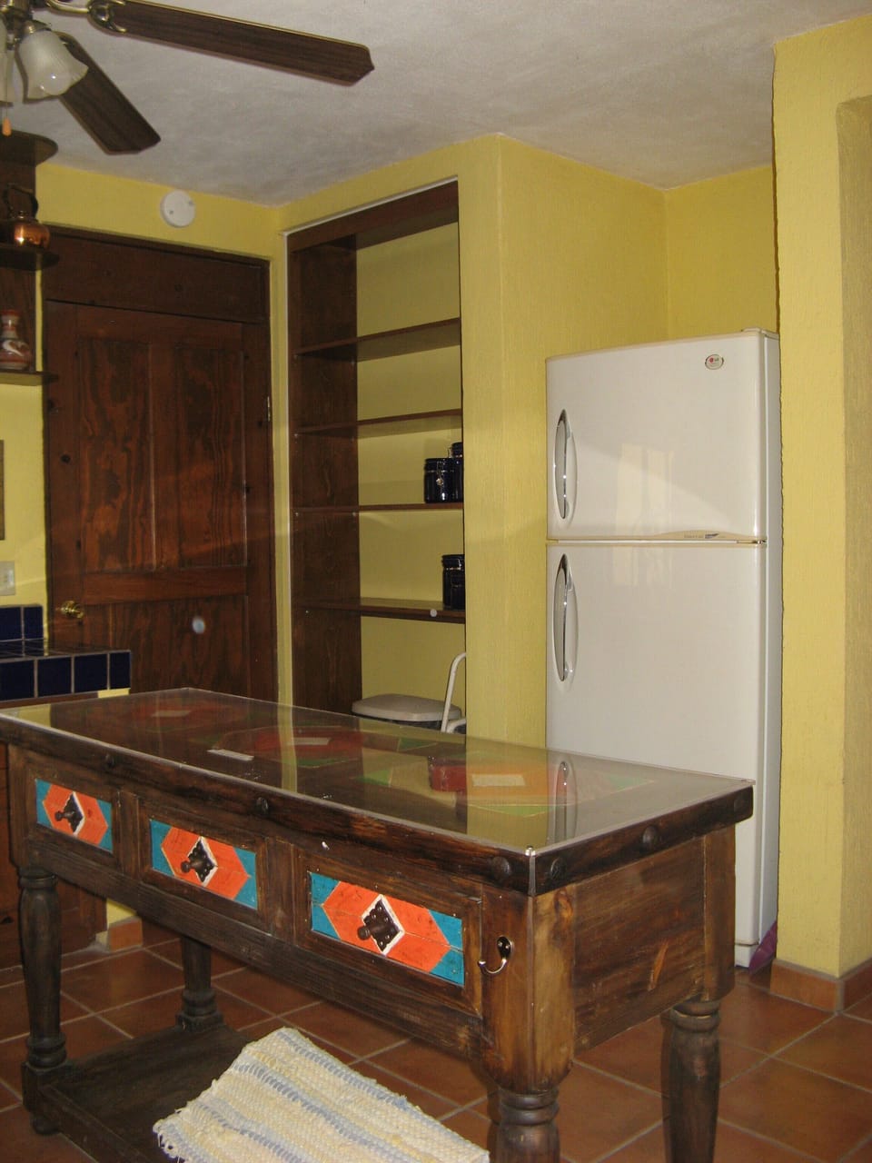 Kitchen looking toward the back door to the patio
