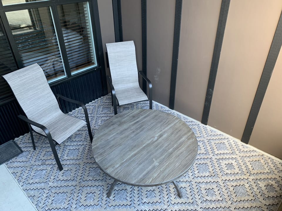 The front porch is a sun trap for morning sun, the perfect place for coffee