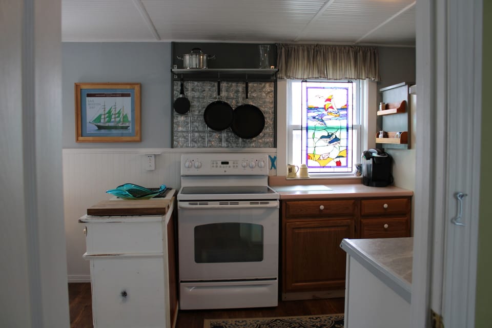 Kitchen has an island for food prep.