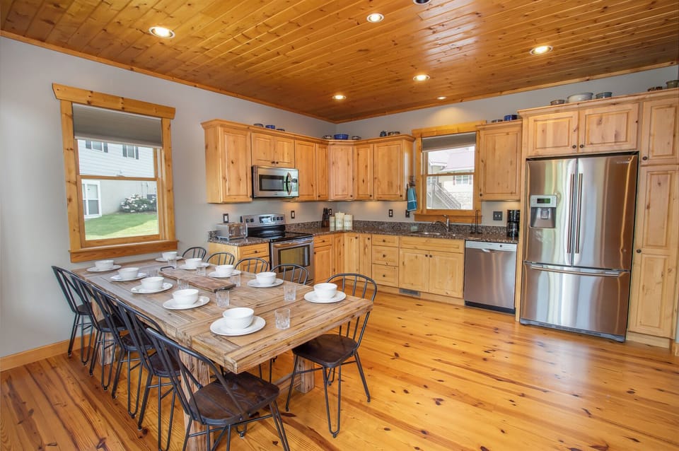 Open Kitchen and Dining with Wood Floors