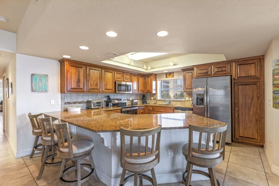 Additional seating at the kitchen counter.