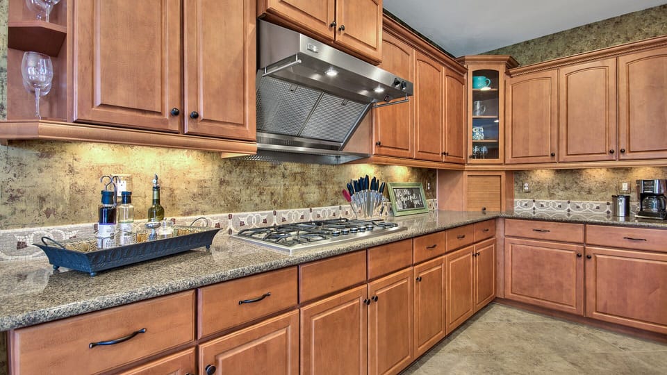 Fully appointed kitchen equipped with gas stove.