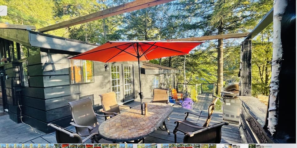 Cottage Front Deck Upper Dinning area and Lower Deck Sitting area also
