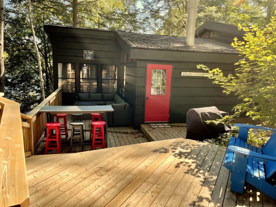 Back Deck With Full Sectional Couch as well as Pub Style Table .
