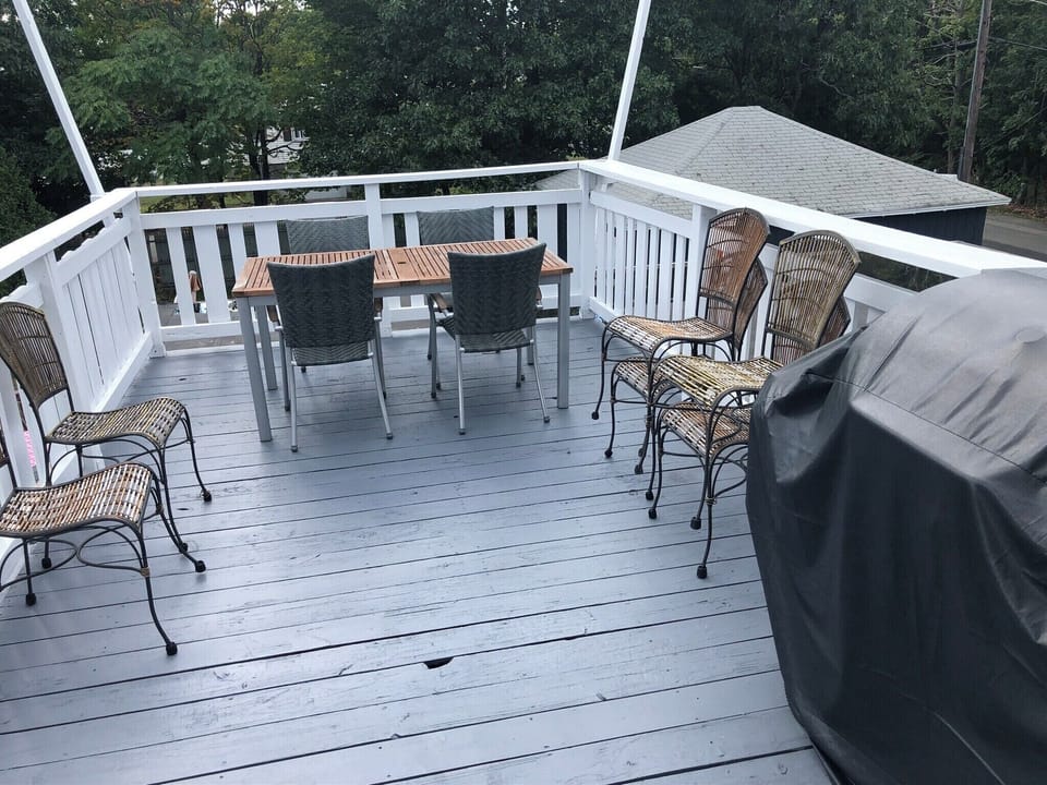 Outdoor deck with seating and full size propane grill