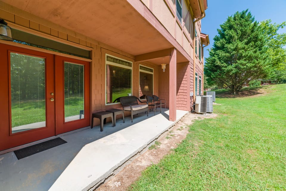 Private back patio located right off living room opens to lawn