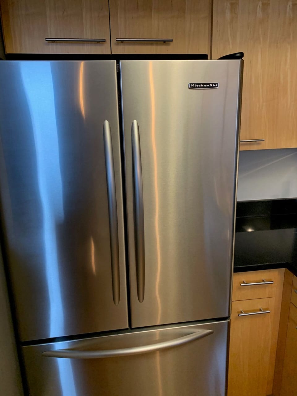 Stainless steel fridge in kitchen