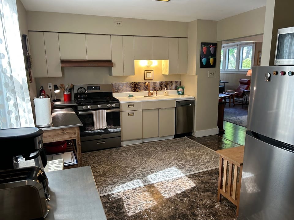 Vintage kitchen with new appliances including dishwasher