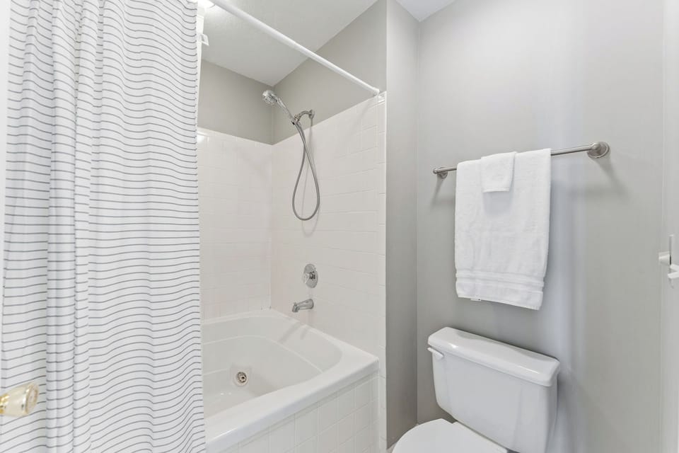 Attached master bathroom with jetted tub