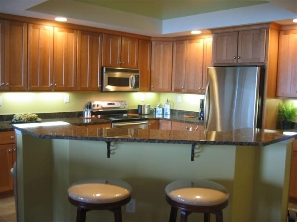 Kitchen is well stocked. Appliances are stainless & counters granite.