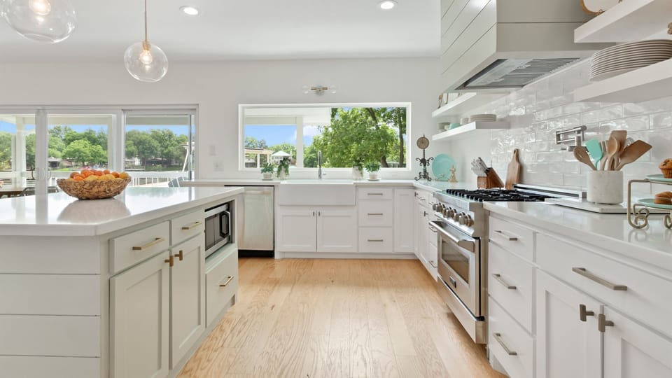 Even doing dishes is enjoyable with this view! Large farmhouse sink/gas range and microwave