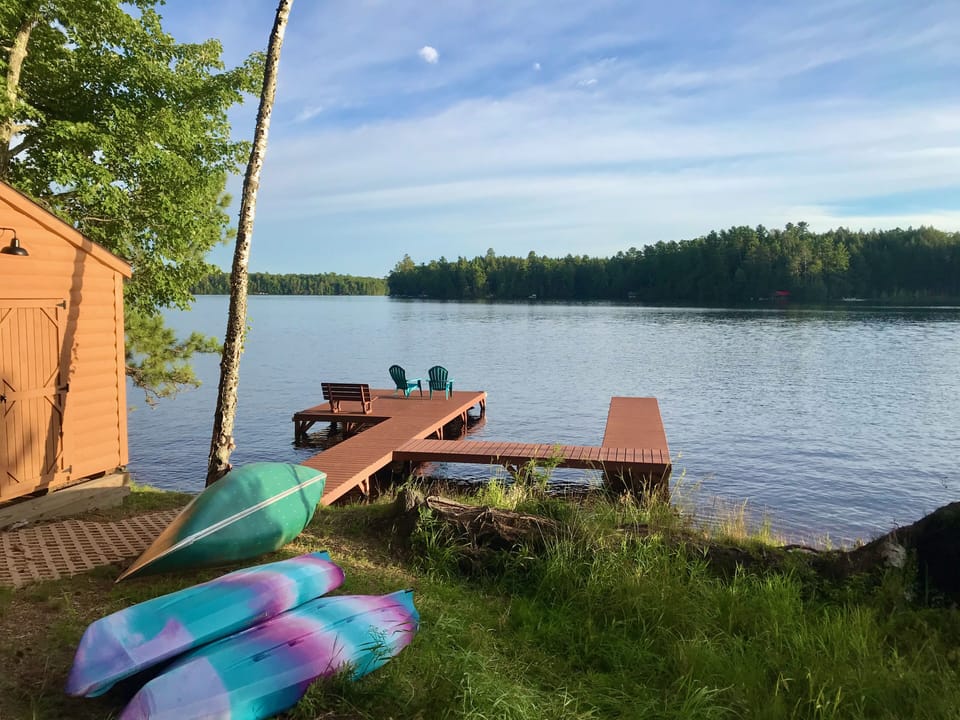 Gorgeous Lakefront Setting with private dock and Kayaks, SUP, Canoe, Water Mat