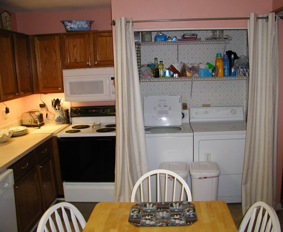 Kitchen with full size washer/dryer. (See the dishwasher to the left.)