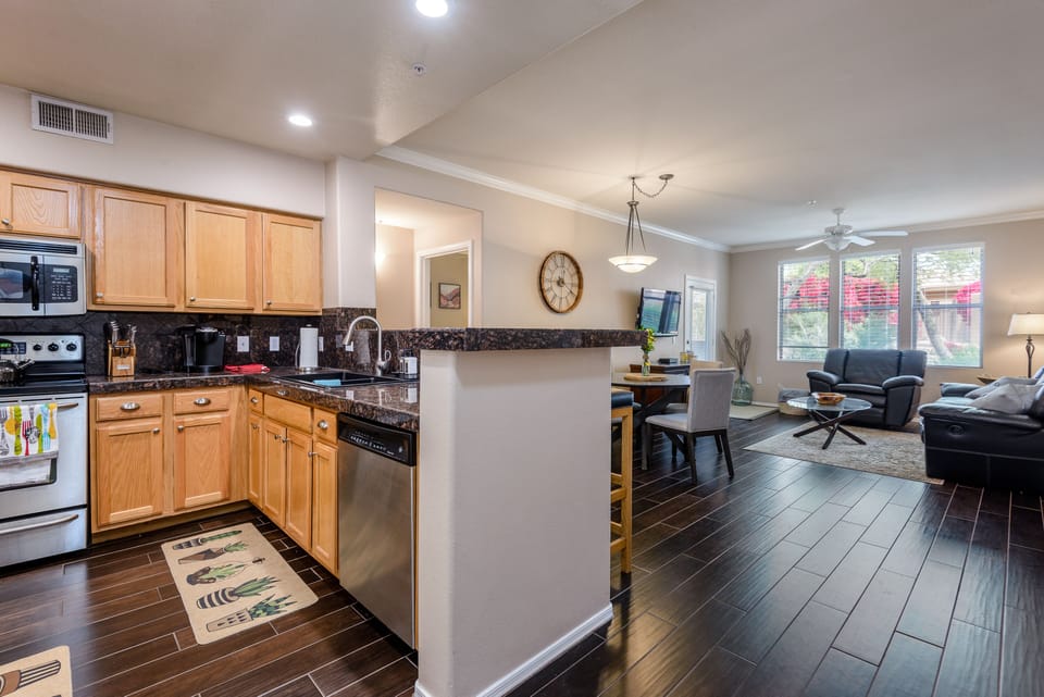 Kitchen opens to living room.