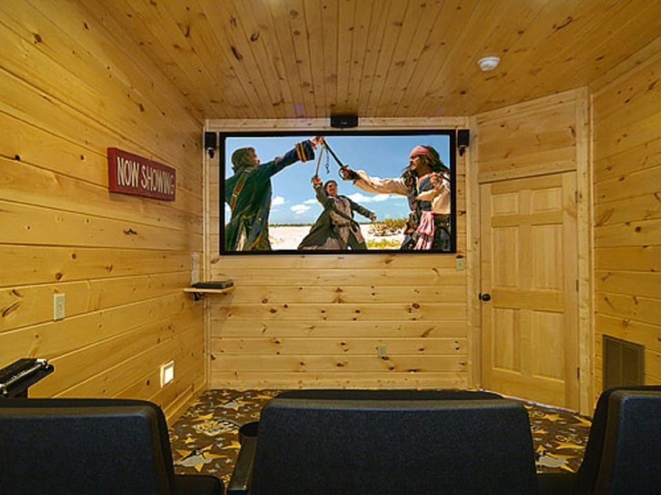 Enjoy watching movies, sports or your favorite show in our theater room!