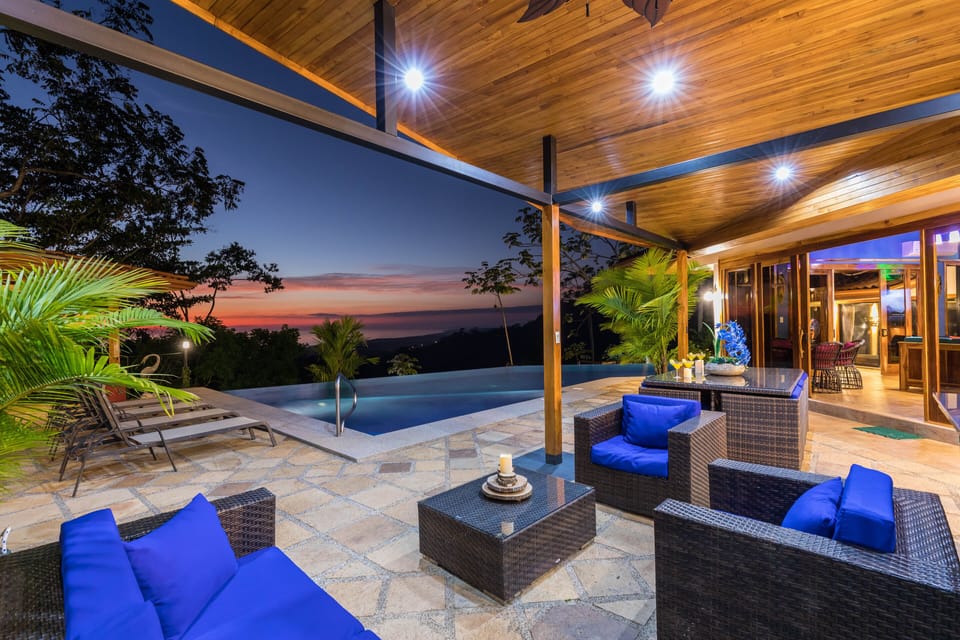 Covered patio, lounge area, dining and rancho/BBQ + outdoor kitchen.