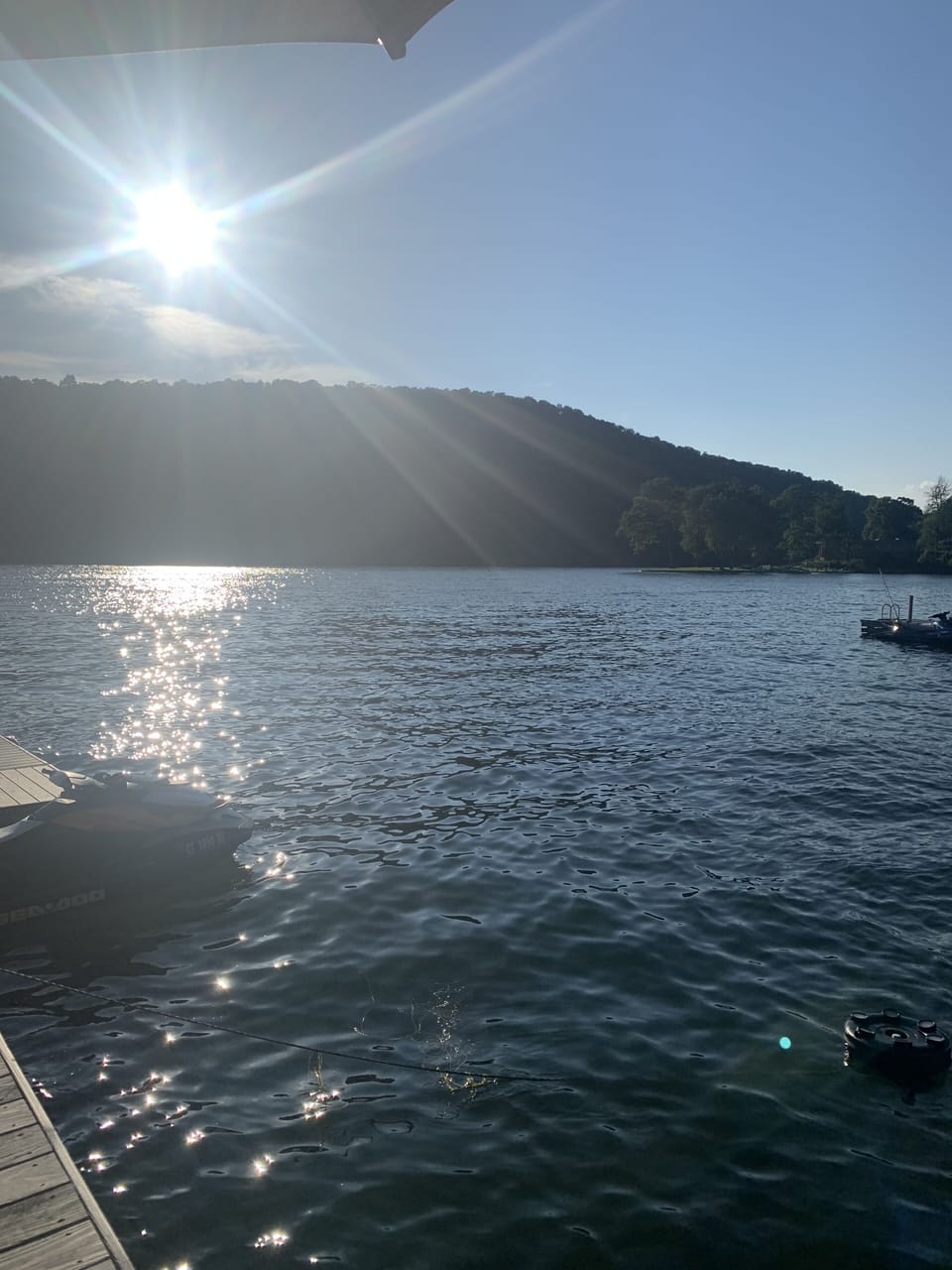 View of lake from dock looking right prior to sunset.  
