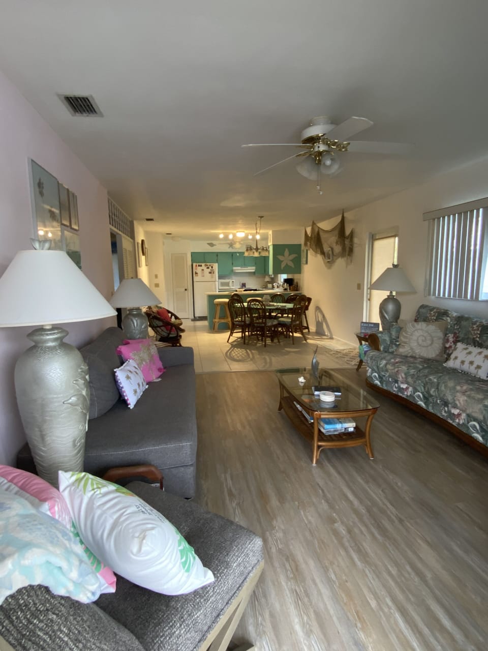 Living room opening up to kitchen.