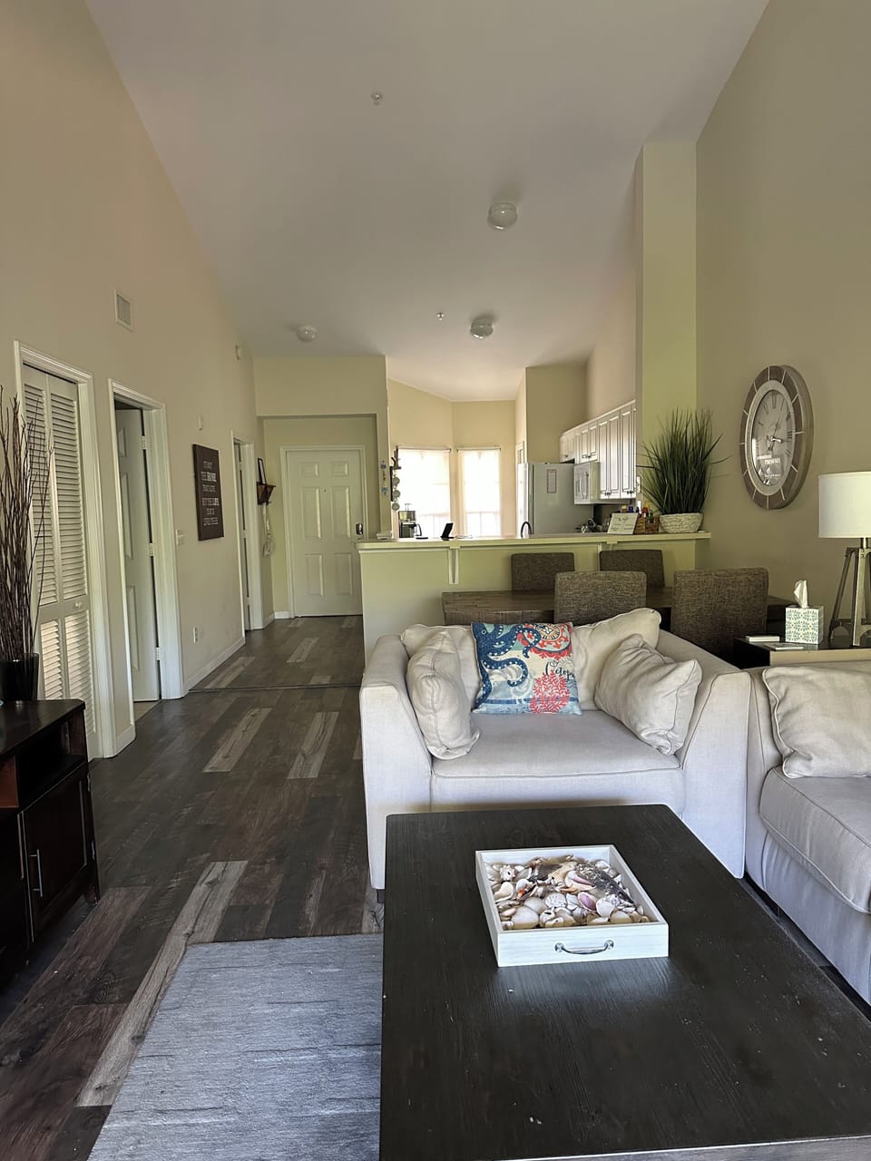 Living room looking back towards kitchen and entry. 