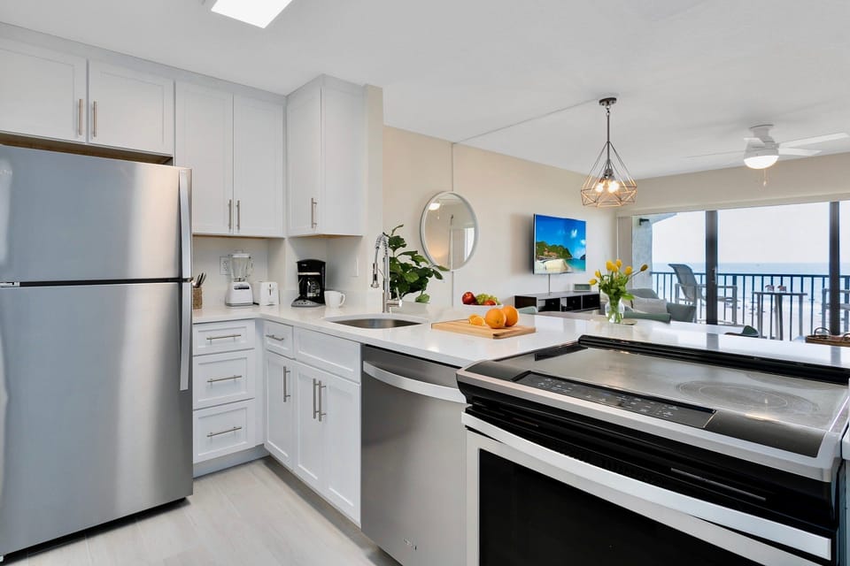 Newly renovated kitchen with sleek finishes and brand-new appliances.
